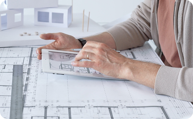 reviewing architectural blueprints.